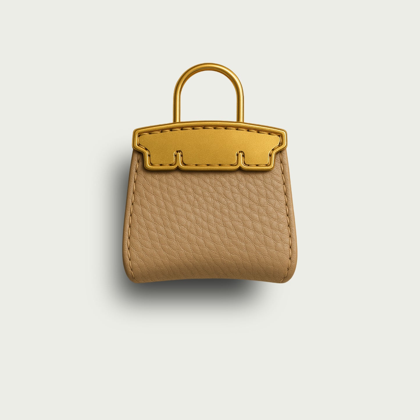 Zoom sur les détails dorés du bijou Mimi, accessoire haut de gamme LaMartine, cuir marron clair.