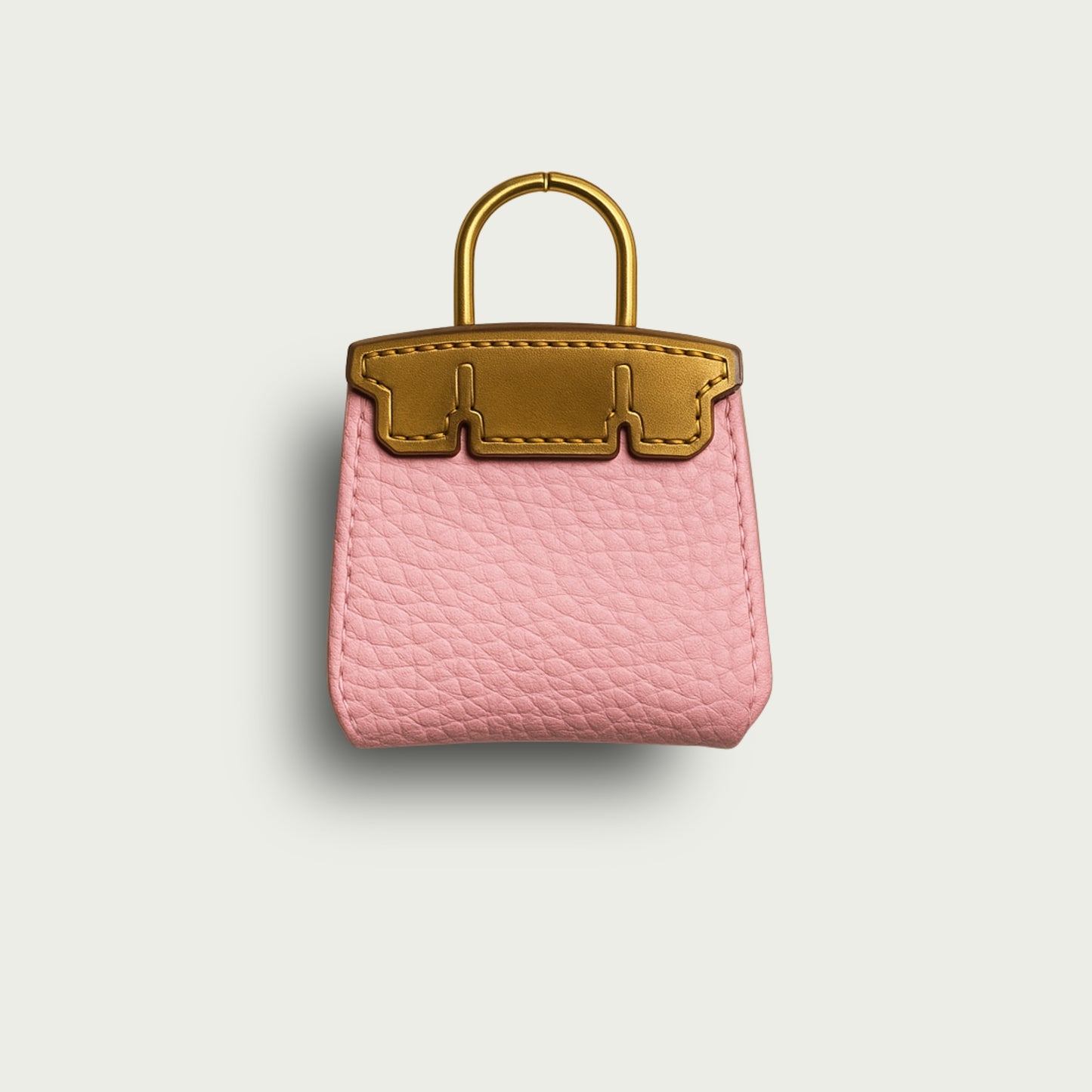 Mimi, bijou de sac en cuir rose et or, accessoire élégant pour personnaliser votre style.