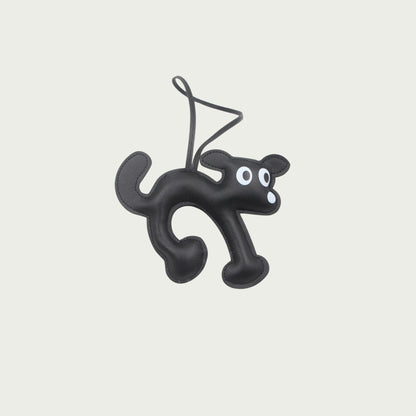 Porte-clés La Truffe en cuir noir en forme de chien, un cadeau raffiné pour les amoureux des accessoires mode.