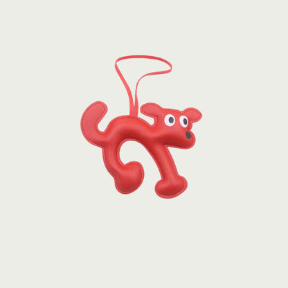 Accessoire en cuir rouge La Truffe, porte-clés en forme de chien, idéal pour personnaliser vos sacs ou vos clés.